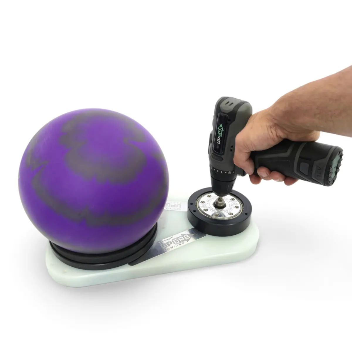 Spinnerᵀᴳ rotating a ten-pin bowling ball with a cordless drill